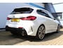 BMW 1-Serie M135i xDrive High Executive | Incl. 12 maanden Garantie | Akrapovič uitlaatsysteem | Dealer onderhouden | Stoelverwarming | Cruise controle | Apple CarPlay/Android Auto | Keyless start | Schakelflippers | Climate controle | Navigatie | Parkeersensoren V+A | Half lederen bekleding |