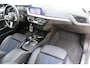BMW 1-Serie M135i xDrive High Executive | Incl. 12 maanden Garantie | Akrapovič uitlaatsysteem | Dealer onderhouden | Stoelverwarming | Cruise controle | Apple CarPlay/Android Auto | Keyless start | Schakelflippers | Climate controle | Navigatie | Parkeersensoren V+A | Half lederen bekleding |