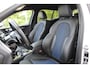 BMW 1-Serie M135i xDrive High Executive | Incl. 12 maanden Garantie | Akrapovič uitlaatsysteem | Dealer onderhouden | Stoelverwarming | Cruise controle | Apple CarPlay/Android Auto | Keyless start | Schakelflippers | Climate controle | Navigatie | Parkeersensoren V+A | Half lederen bekleding |