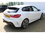 BMW 1-Serie M135i xDrive High Executive | Incl. 12 maanden Garantie | Akrapovič uitlaatsysteem | Dealer onderhouden | Stoelverwarming | Cruise controle | Apple CarPlay/Android Auto | Keyless start | Schakelflippers | Climate controle | Navigatie | Parkeersensoren V+A | Half lederen bekleding |