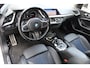 BMW 1-Serie M135i xDrive High Executive | Incl. 12 maanden Garantie | Akrapovič uitlaatsysteem | Dealer onderhouden | Stoelverwarming | Cruise controle | Apple CarPlay/Android Auto | Keyless start | Schakelflippers | Climate controle | Navigatie | Parkeersensoren V+A | Half lederen bekleding |