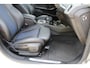 BMW 1-Serie M135i xDrive High Executive | Incl. 12 maanden Garantie | Akrapovič uitlaatsysteem | Dealer onderhouden | Stoelverwarming | Cruise controle | Apple CarPlay/Android Auto | Keyless start | Schakelflippers | Climate controle | Navigatie | Parkeersensoren V+A | Half lederen bekleding |