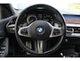 BMW 1-Serie M135i xDrive High Executive | Incl. 12 maanden Garantie | Akrapovič uitlaatsysteem | Dealer onderhouden | Stoelverwarming | Cruise controle | Apple CarPlay/Android Auto | Keyless start | Schakelflippers | Climate controle | Navigatie | Parkeersensoren V+A | Half lederen bekleding |