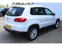Volkswagen Tiguan 1.4 TSI Sport&Style | Incl. 12 maanden Garantie | 2e Eigenaar | Cruise controle | Climate controle | Parkeersensoren V+A | Navigatie | Automatisch inparkeren | 17 Inch LMV | Volledige onderhoudshistorie aanwezig | Origineel NL Auto | NAP |