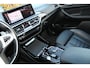 BMW X3 xDrive30e High Executive M-Sport | Incl. 12 maanden Garantie | SoH 96% | Panorama dak | Harman/Kardon Audiosysteem | Head-Up Display | Elektrisch verstelbare stoelen met memory | Adaptive cruise | 360* Camera | Elektrische kofferbakklep | Dodehoekdetectie | Stoelverwarming | Keyless entry/start | Navigatie | Parkeersensoren V+A | Apple CarPlay/Android Auto | Climate controle | Draadloze telefoonlader |
