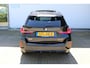 BMW X1 sDrive18i M-Sport | Panorama dak | Elektrisch wegklapbare trekhaak | Stoelverwarming | Achteruitrijcamera | Elektrische kofferbakklep | Keyless entry/start | Half leder/alcantara | Draadloze telefoonlader | Apple CarPlay/Android Auto | Navigatie | Climate controle | Parkeersensoren V+A |