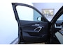 BMW X1 sDrive18i M-Sport | Panorama dak | Elektrisch wegklapbare trekhaak | Stoelverwarming | Achteruitrijcamera | Elektrische kofferbakklep | Keyless entry/start | Half leder/alcantara | Draadloze telefoonlader | Apple CarPlay/Android Auto | Navigatie | Climate controle | Parkeersensoren V+A |