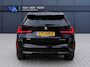 BMW X1 sDrive18i M-Sport | Panorama dak | Elektrisch wegklapbare trekhaak | Stoelverwarming | Achteruitrijcamera | Elektrische kofferbakklep | Keyless entry/start | Half leder/alcantara | Draadloze telefoonlader | Apple CarPlay/Android Auto | Navigatie | Climate controle | Parkeersensoren V+A |