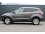 Ford Kuga 1.5 Titanium | Incl. 12 maanden garantie | Voorstoelen verwarmd | Verwarmd stuurwiel | Voorruit verwarming | Bluetooth | DAB | Climate control | Cruise control | Elektrische achterklep | Lichtmetalen velgen