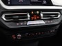 BMW 1-Serie 118i High Executive M-Sport (NL-Auto / Virtual Display / Cruise / Carplay / Sfeerverlichting / Navi)