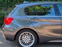 BMW 1-Serie 120i High Executive M Sport Apple CarPlay Trekhaak LED NAP Dealer onderhouden RIJKLAAR 184pk