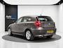 BMW 1-Serie 120i High Executive (LEDER, CRUISE, TREKHAAK, STOELVERWARMING)