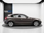 BMW 1-Serie 120i High Executive (LEDER, CRUISE, TREKHAAK, STOELVERWARMING)