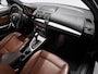 BMW 1-Serie 120i High Executive (LEDER, CRUISE, TREKHAAK, STOELVERWARMING)