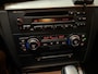 BMW 1-Serie 120i High Executive (LEDER, CRUISE, TREKHAAK, STOELVERWARMING)