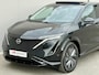 Nissan Ariya e-4ORCE Evolve 91 kWh 4WD / 306 PK / Leder / 1.500 kg Trekgewicht / Warmtepomp / 10 jaar Nissan More Garantie / Stoelverwarming voor en achter / Schuif-kantel dak / HUD / Stoelventilatie / Stuurverwarming / Rondomzicht camera / Elektrisch verstelbare stoelen met geheugen / Elektrische achterklep / Adaptieve cruise control / Apple Carplay/Android Auto /