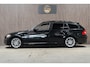 BMW 3-Serie Touring 320i Pano Navi PDC Cruise Stoelverwarming