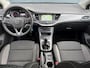 Opel Astra Sports Tourer 1.2 Business Executive ✓1e Eigenaar✓146pk✓Camera✓Trekhaak✓Carplay✓Airco✓Cruise✓Pdc V+A✓Lm velgen✓Comfortstoelen✓6 Bak✓N.A.P✓Nieuwe Apk bij Aflevering