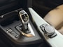 BMW 4-Serie Gran Coupe 440i xDrive High Executive Luxury | Harman Kardon | 19" M | Head Up | Keyless | Afn. Trekhaak