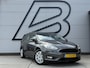Ford Focus Wagon 1.0 Titanium 1e Eigenaar|Navi|Trekhaak|Carplay|Cruise|Airco|PDC|Stoelverwarming|APK tot 07-2027