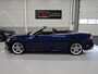 Audi A5 Cabriolet 40 TFSI Launch edition Sport S-Line Matrix Nekverwarming Trekhaak 3-Zone airco Digitaal Camera ACC Navigatie Automaat Alcantara Massagestoelen App connect 19 inch Sportvelgen Navarrablauw metallic Nieuwstaat