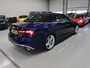 Audi A5 Cabriolet 40 TFSI Launch edition Sport S-Line Matrix Nekverwarming Trekhaak 3-Zone airco Digitaal Camera ACC Navigatie Automaat Alcantara Massagestoelen App connect 19 inch Sportvelgen Navarrablauw metallic Nieuwstaat