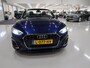 Audi A5 Cabriolet 40 TFSI Launch edition Sport S-Line Matrix Nekverwarming Trekhaak 3-Zone airco Digitaal Camera ACC Navigatie Automaat Alcantara Massagestoelen App connect 19 inch Sportvelgen Navarrablauw metallic Nieuwstaat