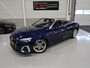 Audi A5 Cabriolet 40 TFSI Launch edition Sport S-Line Matrix Nekverwarming Trekhaak 3-Zone airco Digitaal Camera ACC Navigatie Automaat Alcantara Massagestoelen App connect 19 inch Sportvelgen Navarrablauw metallic Nieuwstaat