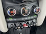 MINI Cooper Cabrio 1.5 136 pk Automaat JCW Navigatie Head-Up Display Harman Kardon Audio Sportstoelen leder Stoelverwarming Led Koplampen 18 Inch Velgen Parkeersensoren NL Auto John Cooper Works Pakket