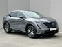 Nissan Ariya e-4ORCE Evolve 91 kWh / 4WD / Leder / Head- Up Display / Warmtepomp / 10 Jaar Nissan More Garantie / Stoelverwarming voor en achter / Schuif-Kantel Dak / Stoelventilatie / Stuurverwarming / Rondomzicht camera / Elektrisch Verstelbare Stoelen met Geheugen / Elektrische Achterklep / Adaptief Cruise Control / Apple Carplay & Android Auto /