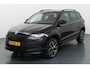 Skoda Karoq 1.5 TSI ACT Sportline Business Sportief silhouet in Black Magic, met alle ruimte die je van een Karoq verwacht