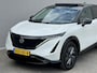 Nissan Ariya e-4ORCE Evolve 91 kWh 4WD / 306 PK / Leder / 1.500 kg Trekgewicht / Warmtepomp / 10 jaar Nissan More Garantie / Stoelverwarming voor en achter / Schuif-kantel dak / Stoelventilatie / Stuurverwarming / Rondomzicht camera / Elektrisch verstelbare stoelen met geheugen / Elektrische achterklep / Adaptieve cruise control / Apple Carplay/Android Auto /