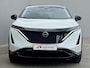 Nissan Ariya e-4ORCE Evolve 91 kWh 4WD / 306 PK / Leder / 1.500 kg Trekgewicht / Warmtepomp / 10 jaar Nissan More Garantie / Stoelverwarming voor en achter / Schuif-kantel dak / Stoelventilatie / Stuurverwarming / Rondomzicht camera / Elektrisch verstelbare stoelen met geheugen / Elektrische achterklep / Adaptieve cruise control / Apple Carplay/Android Auto /