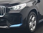 BMW iX1 xDrive30 X Line 67 kWh 313pk Dealer O.H. | Trekhaak Af Fabriek | Adaptive Cruise | Lederen Sportstoelen Massage & Verwarmd | Camera | Adaptief M-onderstel | Blis | Sfeerverlichting | Apple Carplay | Navigatie | DAB |