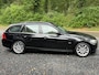 BMW 3-Serie Touring 320i High Executive Panoramadaken LEER Navigatie Cruise Control Climate Control