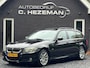 BMW 3-Serie Touring 320i High Executive Panoramadaken LEER Navigatie Cruise Control Climate Control