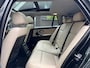 BMW 3-Serie Touring 320i High Executive Panoramadaken LEER Navigatie Cruise Control Climate Control