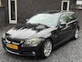 BMW 3-Serie Touring 320i High Executive Panoramadaken LEER Navigatie Cruise Control Climate Control