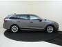 Skoda Octavia Combi 1.0 e-TSI Business Edition Plus | Trekhaak | Adaptieve cruise control | Keyless | Dodehoek detectie | Parkeersensoren | Stuurwielverwarming | Elektrische kofferklep | Sfeerverlichting | Navigatie |
