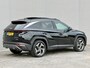 Hyundai Tucson 1.6 T-GDI PHEV Comfort Smart Sky 4WD / Dealer Onderhouden / SOH 100% / Panoramadak / Adaptief Cruise Control / Navigatie / Achteruitrijcamera / Apple Carplay & Android Auto / Stoel & Stuurverwarming / 19" LM Velgen / Elektrische Achterklep /