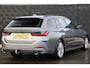 BMW 3-Serie Touring 320e PHEV | Leder | Pano | HUD | 360 | Elek. Trekhaak | Memory