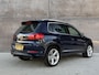 Volkswagen Tiguan 2.0 TSI Sport&Style 4Motion R-line | Trekhaak | APK 09-2027 | 2200KG trekgewicht | Xenon | Climate control | Camera |