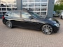 BMW 3-Serie Touring 320i High Executive M-Sport / Pano / Carplay / Leder / Trekhaak .
