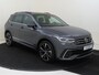 Volkswagen Tiguan 1.4 TSI eHybrid R-Line Business | SoH 91% | Panoramadak | Trekhaak | Lederen bekleding | Bestuurdersstoel met memory | Adaptieve demping | Matrix LED verlichting | Keyless | Adaptieve cruise control | Stoel- en stuurwielverwarming |