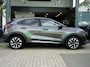 Ford Puma EcoBoost 125 Hybrid Titanium / NAVI / CAMERA / PDC V+A / PARK ASSIST / STOELV. / STUURV. / VOORRUITV. / CRUISE / CLIMATE / APPLE CARPLAY / ANDROID AUTO / FULL LED / DAB+ / 17''