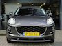 Ford Puma EcoBoost 125 Hybrid Titanium / NAVI / CAMERA / PDC V+A / PARK ASSIST / STOELV. / STUURV. / VOORRUITV. / CRUISE / CLIMATE / APPLE CARPLAY / ANDROID AUTO / FULL LED / DAB+ / 17''
