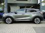 Ford Puma EcoBoost 125 Hybrid Titanium / NAVI / CAMERA / PDC V+A / PARK ASSIST / STOELV. / STUURV. / VOORRUITV. / CRUISE / CLIMATE / APPLE CARPLAY / ANDROID AUTO / FULL LED / DAB+ / 17''