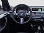 BMW X1 sDrive20i Orange Edition II | Dealer OH! | Pano | Trekhaak | Leder | H&K Audio