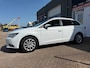SEAT Leon ST 1.2 TSI Style met trekhaak en parkeersensoren en navigatie en bluetooth en cruise controle en airco