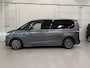 Volkswagen Multivan 1.4 eHybrid Energetic 7p. PANO/LEER+MASSAGE/ADAPTIVE-ONDERSTEL/H&K/HEAD-UP/KEYLESS/EL.SCHUIFDEUREN/SFEER/ACC/CAMERA/PRIVACY/EL.A.KLEP/INDIUMGRAU METALLIC/VOLLEDIG VW DEALER HISTORIE